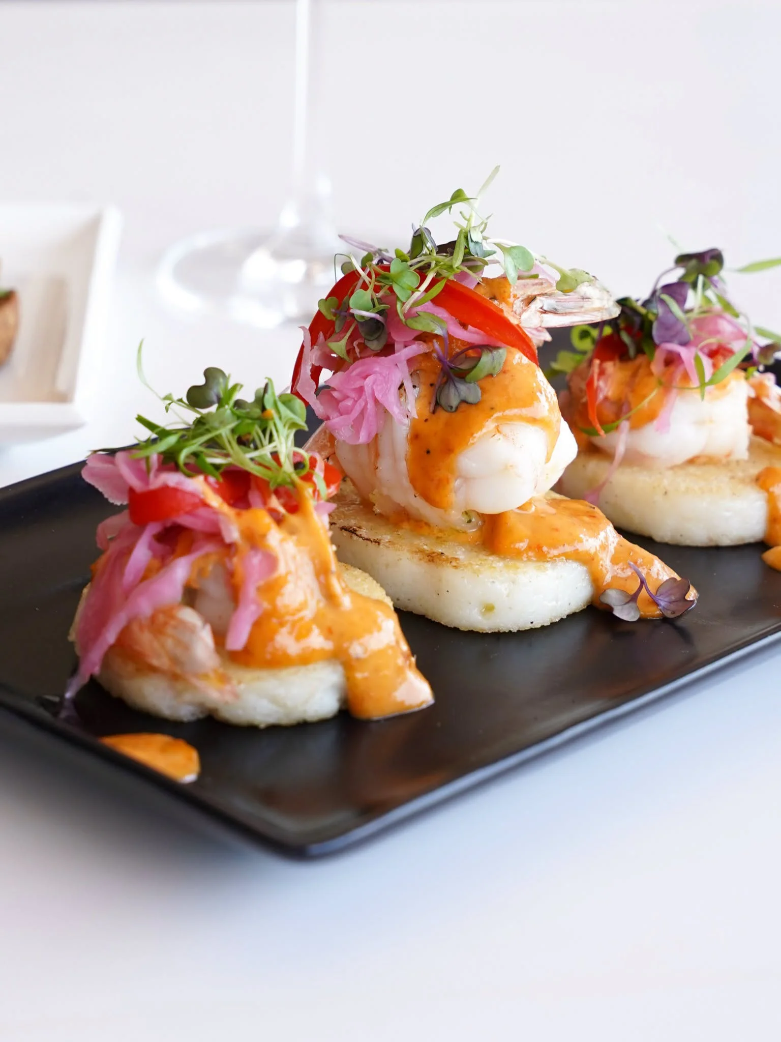 Prawn bites on polenta with pickled onion at Waterbar & Grill Steakhouse, Cairns