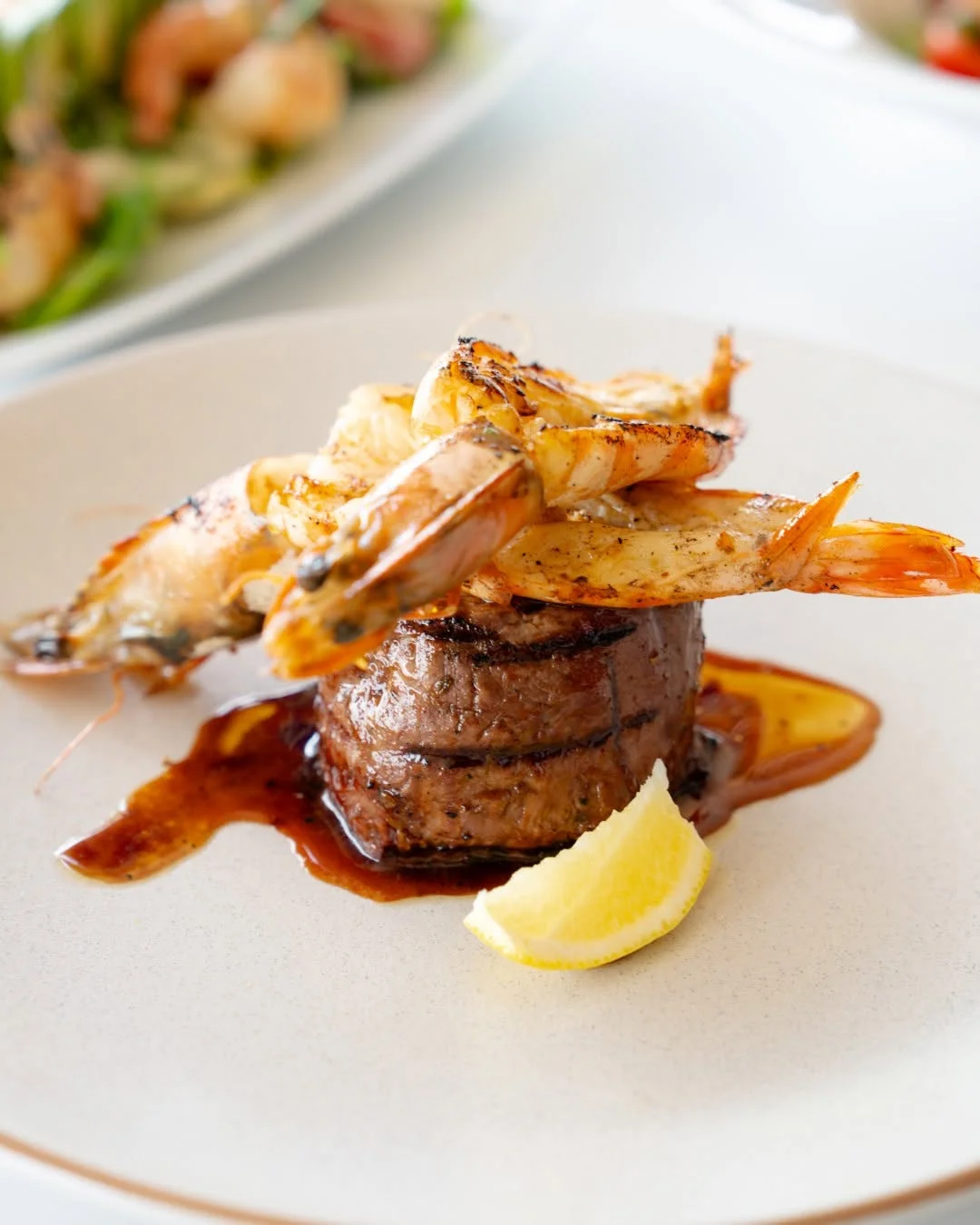 Eye fillet topped with grilled prawns at Waterbar & Grill Steakhouse, Cairns